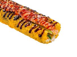 Tempura sushi roll with salmon and cucumber lying photo