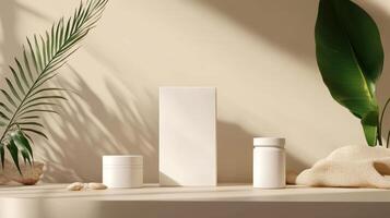 White cosmetic products on a table with plants photo