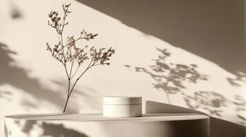 A white container with a plant on it photo