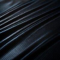 Closeup view of a dark, textured fabric with subtle highlights. photo