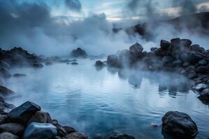Serene Geothermal Hot Spring Surrounded by Misty Rocks and Clouds at Dawn photo