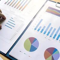 Financial Report Analysis Showing Business Growth and Key Performance Indicators photo