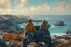 Two people in a jeep driving along the coast photo