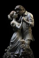 A statue of a couple dancing in front of a black background photo