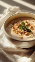 Creamy gorgonzola cheese dip with walnuts and almonds served in a bright bowl for an appetizing snack photo