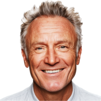 Older man with silver hair and a smile looks warm and charismatic png