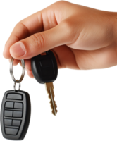 Hand holding car keys and remote. Closeup of keys with ring, black remote, and brown hand. isolated over a black background with clear details png