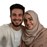 A young man and woman in a white hijab pose for a selfie png