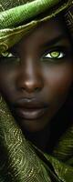Mesmerizing gaze framed by an elegant green fabric, reflecting light in a captivating way photo
