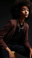 Elevate your style with this chic ensemble featuring a statement necklace and textured blazer photo