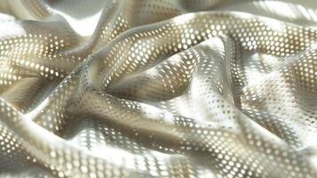 Mesmerizing fabric textures create a delicate dance of light and shadow, captivating the eye with intricate details photo