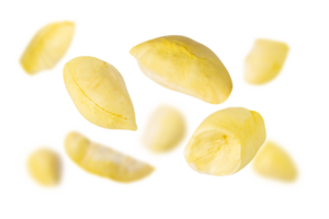 Fresh durian seeds scattered on transparency background, showcasing their unique shape and texture png