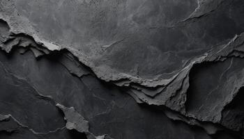 A rugged, textured black surface with layered elements, showcasing modernity and sophistication, perfect for backgrounds in design or architectural contexts. photo
