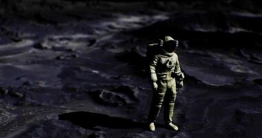 Astronaut stands on the moons surface exploring the lunar landscape video