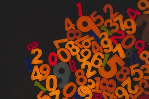 Abstract Mathematical Numbers on a Dark Background. Finance and Data Concept. Futuristic Digital Design. Cyber Tech Theme photo