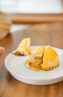 Sliced Mango Dooms Cake on The Table photo