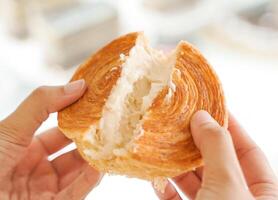 Ladies Spliting Cromboloni Cakes photo