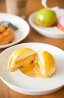 Close Up Photography of Sliced Mango Doom Cakes photo