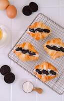Top View of Mini Croissant Topped With Oreo photo