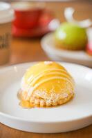 Yellow Mango Dom Cakes With Blur Background photo