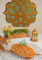 Close Up Photography of Ramadan and EID Mubarak Pies photo