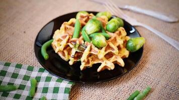 Vegetable waffles with Brussel sprouts and green beans. video