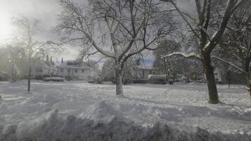 View through bus window in snowy Munich, Germany, reveals streets blanketed in snow, creating a winter fairy tale. Public transport moves through snow-covered city amid heavy snowfall in Deutschland video