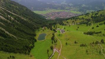 Aerial view Nebelhorn snowmaking pond in Oberstdorf collects water for artificial snow, supporting skiing activities despite variable natural snowfall. Supporting sustainable snow coverage in Alps. video