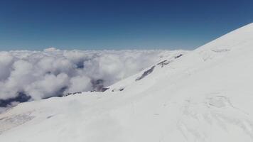 A view of a snowy mountain from above photo
