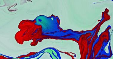 A painting of a red, blue, and green bird photo