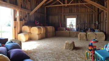 Rustic Barn Interior with Hay Bales and Kids' Toys photo