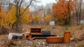 Autumnal Derelict Landscape with Abandoned Furniture photo