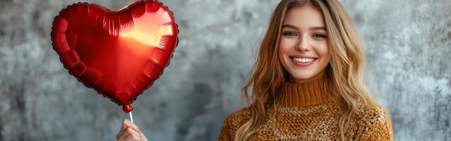 Cheerful Girl Holding Heart Balloon with Warm Smile photo