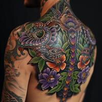 A man with tattoos on his back and chest photo