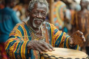 An old man in a colorful shirt playing a drum photo