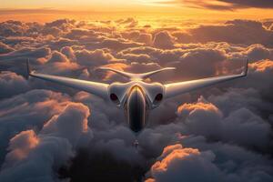 A jet plane flying through the clouds at sunset photo