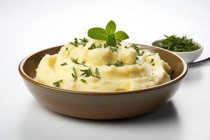 Mashed potatoes with herbs in a bowl photo