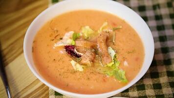 Dietary fish soup puree with salmon on a light background video