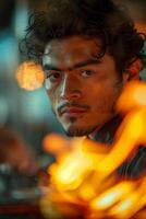 A man with a fire in his hand photo