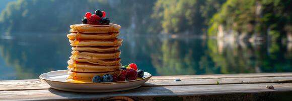 A stack of pancakes on a table photo