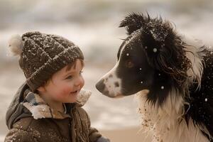 A boy and a dog on the beach photo