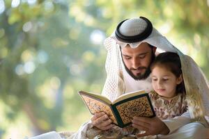 Quran reading with father and daughter photo