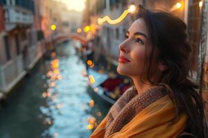 A woman looking at the canal in venice photo