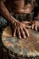 A man's hands are on a drum photo