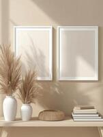 Empty Picture Frames With Pampas Grass On Beige Wall photo
