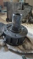 Using Two Screwdrivers to Remove a Snap Ring on a Transfer Case photo