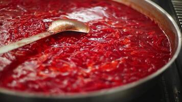 A Vibrantly Colored Red Beetroot Soup is Deliciously Cooking in a Large Pot for Enjoyment. Media video