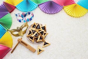 Purim Festive Setup. Colorful Purim scene with masks, photo
