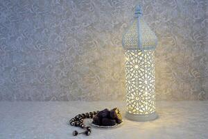 Ramadan Kareem. Eid al Fitr. Lantern and Dates photo