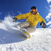 Man Snowboarding Down Snowy Slope on Sunny Day photo